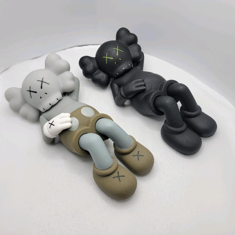 KAWS Laying Vinyl Figure 6 Inches