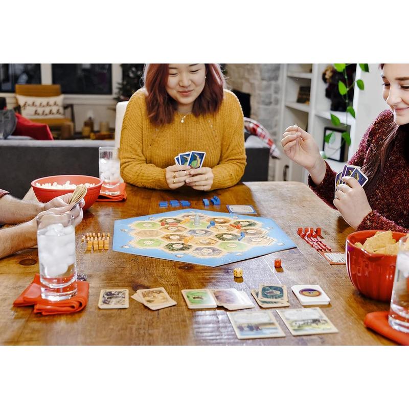 CATAN Board Game - Embark On A Journey Of Discovery And Trade! Civilization Building Strategy Game, Family Game For Kids & Adults, Ages 10+, 3-4 Players, 60-90 Minute Playtime, Made By CATAN Studio