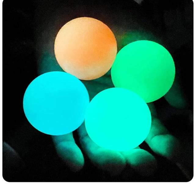 Glow-in-the-dark sticky ceiling balls, stress relief for all ages. 4-pack lumi balls, perfect for stocking stuffers