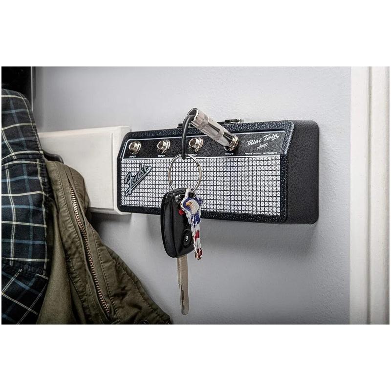 Licensed Fender Jack Rack- guitar amp key holder, includes 4 guitar plug keychains and 1 wall mounting kit. Quick and easy installation.