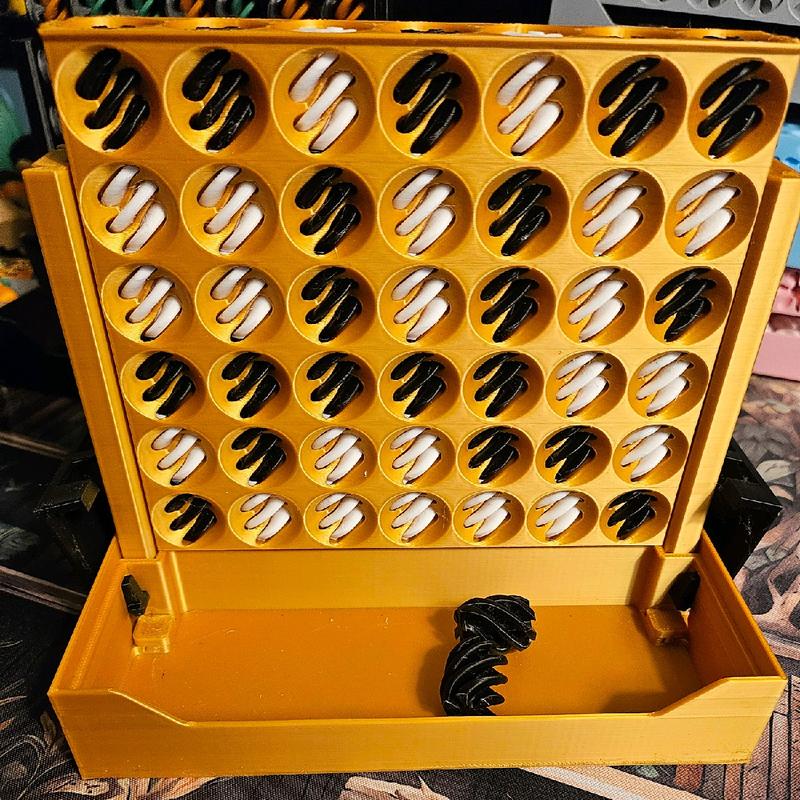 Connect 4-Tex Vortex Passthrough Board Game