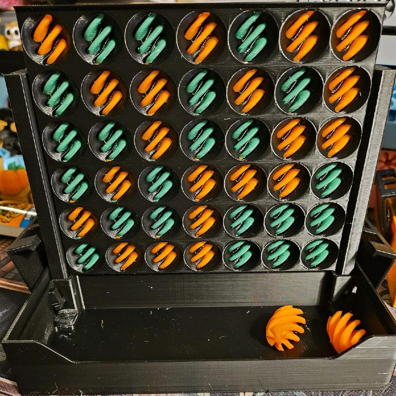 Connect 4-Tex Vortex Passthrough Board Game