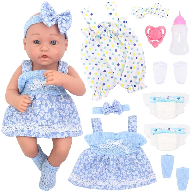 14 inch baby doll with accessories including clothes bottles, diapers, pacifiers